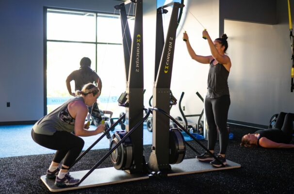 two women working out doing the same exercise