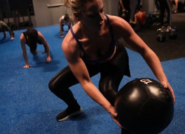 SWEAT440 gym class member working out