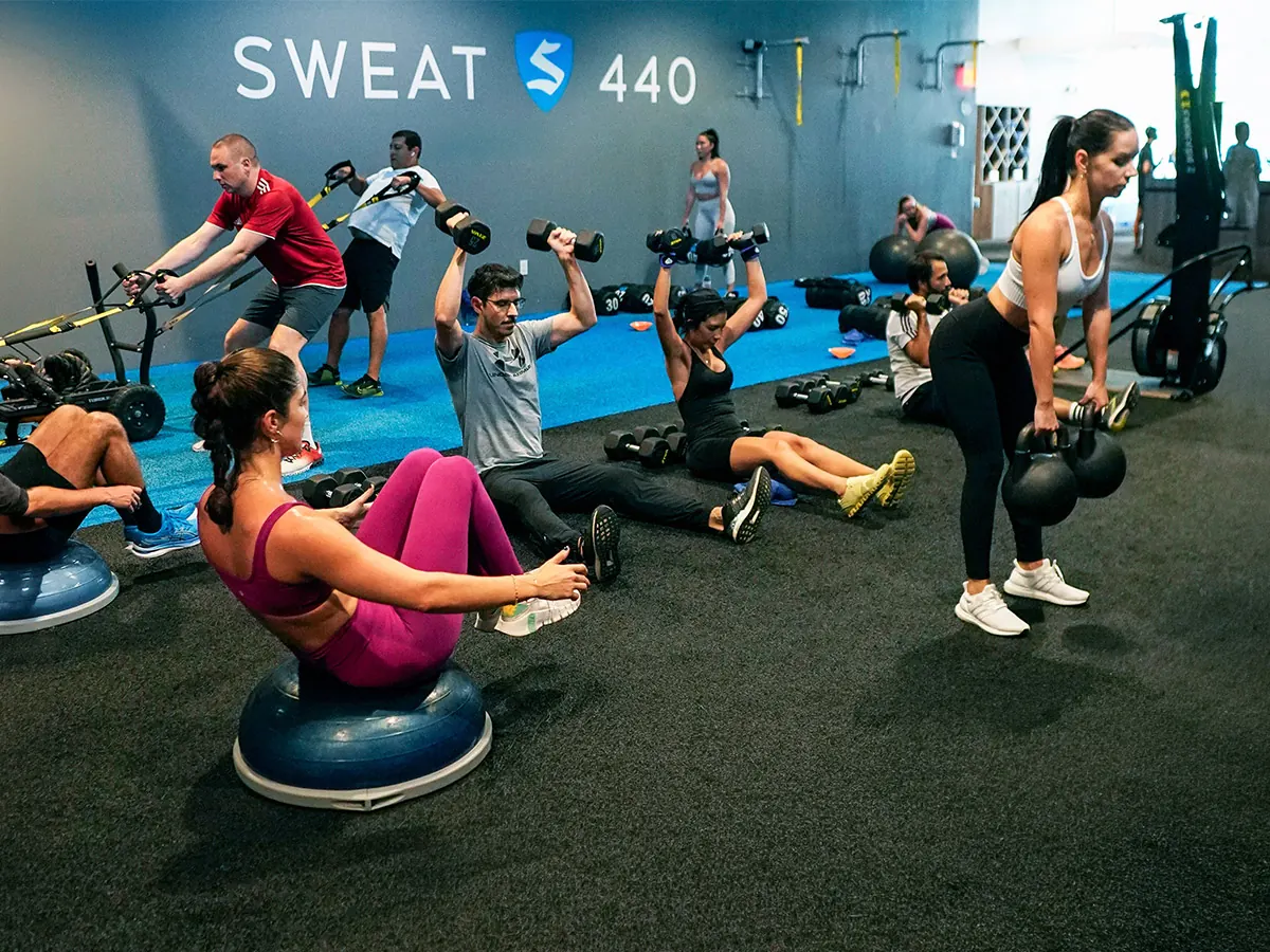 SWEAT440 members in a group fitness class