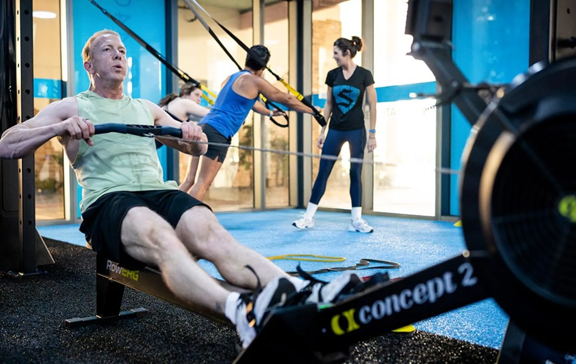 SWEAT440 members training in a group fitness class