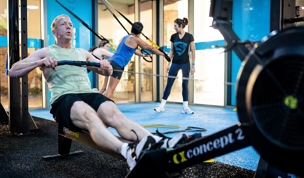 SWEAT440 members training in a group fitness class