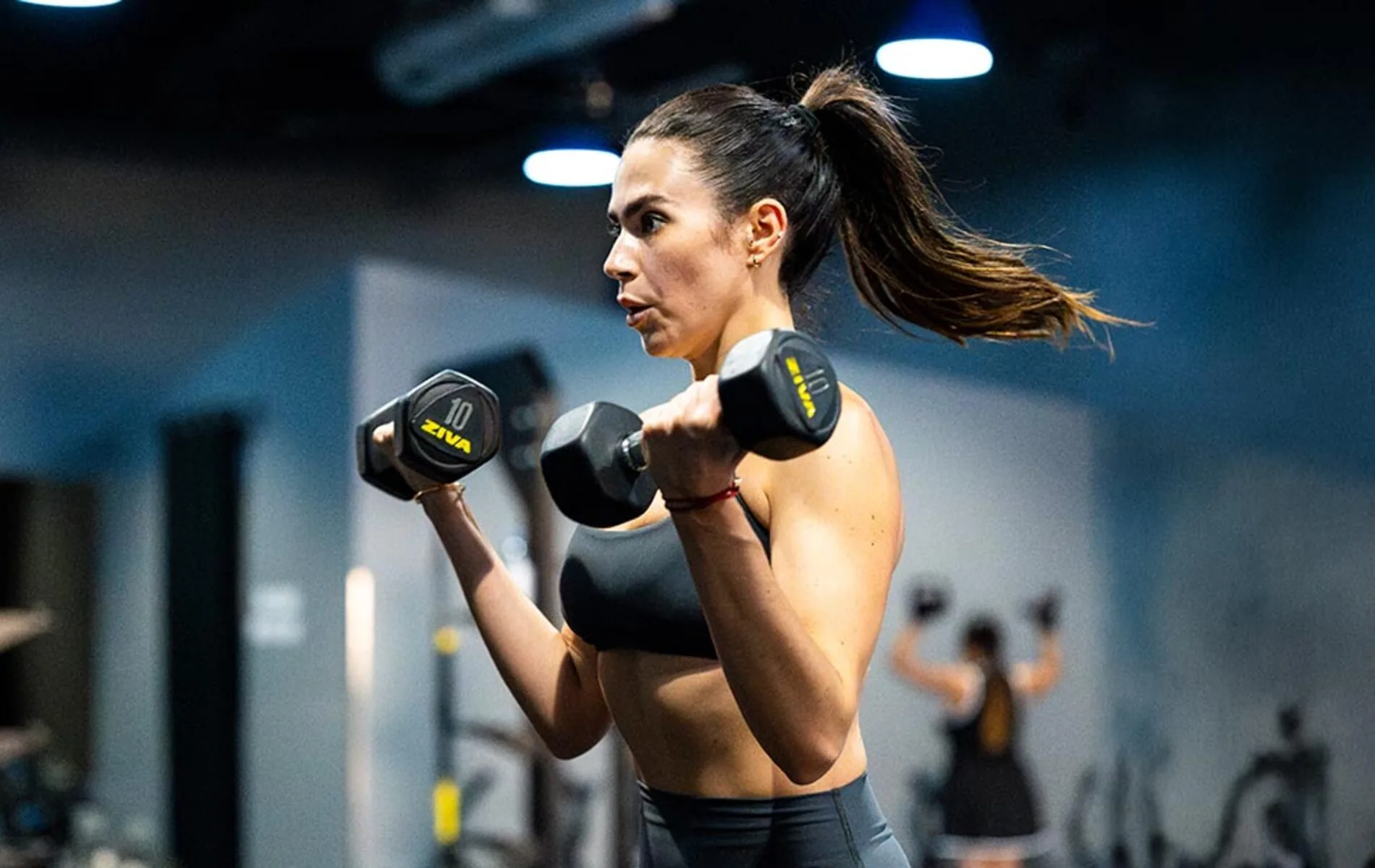 SWEAT440 members training in a group fitness class